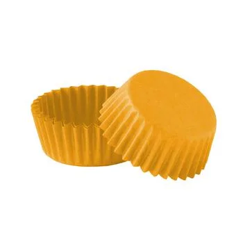 Orange paper baking forms for muffins and cupcakes Stock Photos