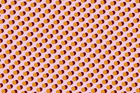 Orange pattern on a light pink background. Pop art design, creative citruses Stock Illustration