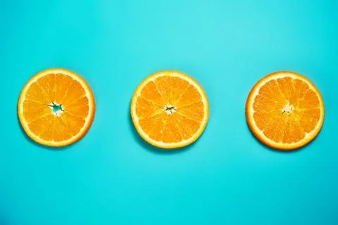 Orange pattern on the light turquoise background. Stock Photos