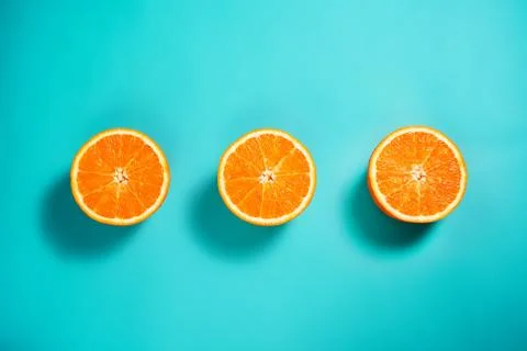 Orange pattern on the light turquoise background. Stock Photos