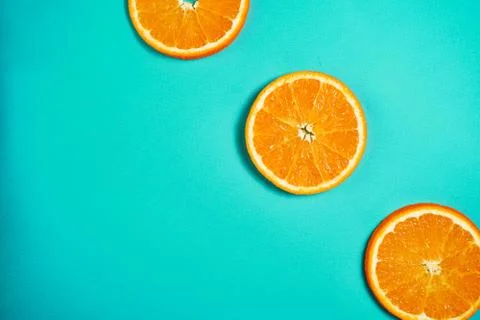 Orange pattern on the light turquoise background. Stock Photos