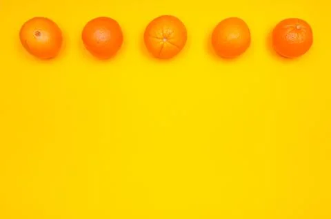Orange pattern on orange background citrus arrangement Stock Photos