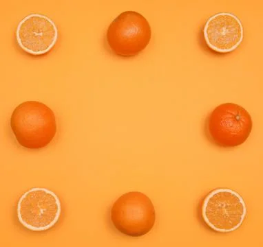 Orange pattern on orange background citrus arrangement Stock Photos