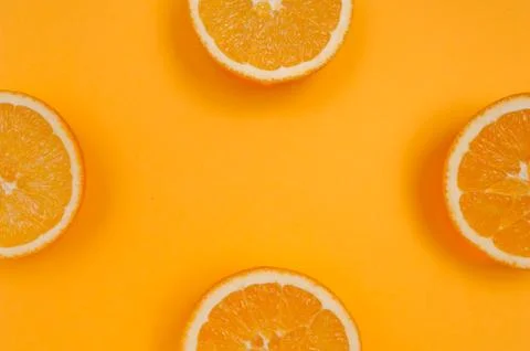 Orange pattern on orange background citrus arrangement Stock Photos