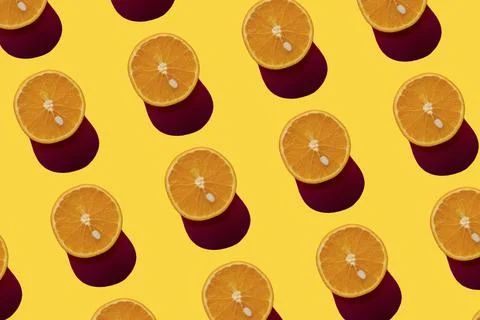 Orange pattern on a yellow background. Pop art design, creative citruses. Yellow 스톡 일러스트