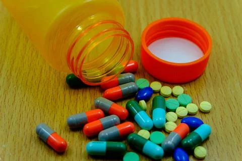 Orange pill bottle. Stock Photos