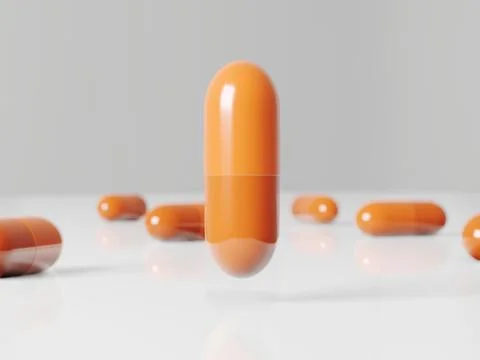 Orange pill floating in white studio with white capsules around. Covid-19 Illustrazione stock