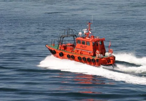 Orange pilot boat Stock Photos