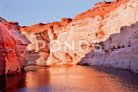 Orange pink antelope canyon reflection lake powell arizona Stock Photos