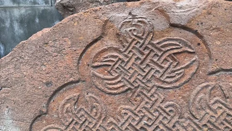 Orange pink color stone in ancient tombstone grave of Armenian cemetery ruins Stock Footage 338348632