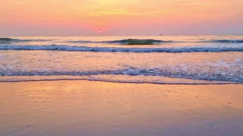 Before the orange-pink sun dips below the horizon by the sea in Thailand ge.. Stock Footage 300078954