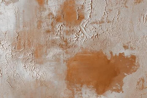 Orange plaster texture with rough decorative surface, visible brush strokes.. Stock Photos