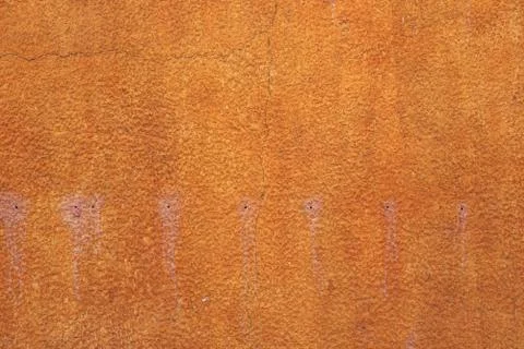 Orange plaster wall Stock Photos