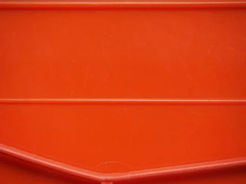 Orange plastic background Stock Photos
