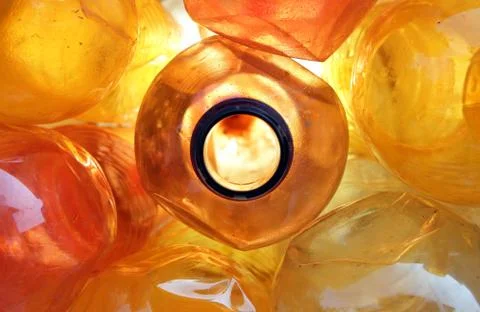 Orange plastic bottles Stock Photos