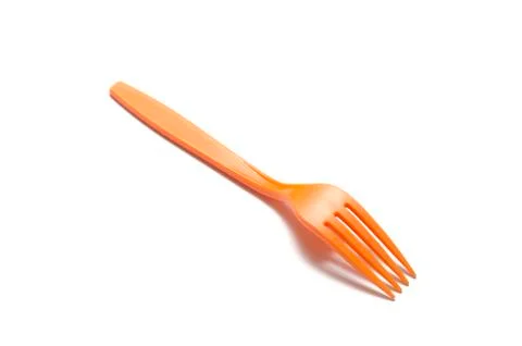 Orange plastic fork Stock Photos