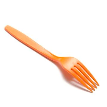 Orange plastic fork Stock Photos