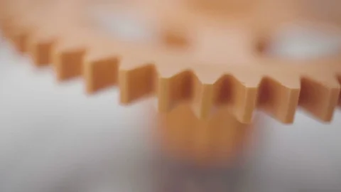 Orange plastic rotating gear Stock Footage 81071727