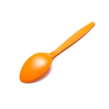 Orange plastic spoon Stock Photos