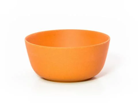 Orange plastic tableware isolated on white background. Stock Photos