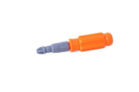 Orange plastic toy screwdriver tool isolated on a pure white background Stock Photos