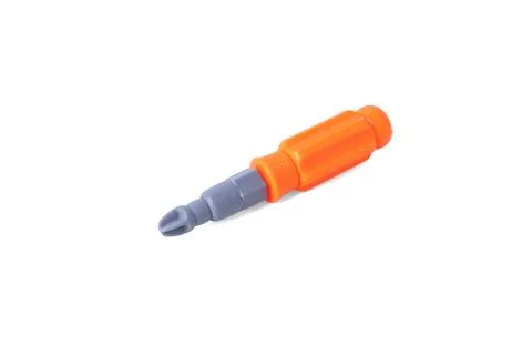 Orange plastic toy screwdriver tool isolated on a pure white background Stock Photos