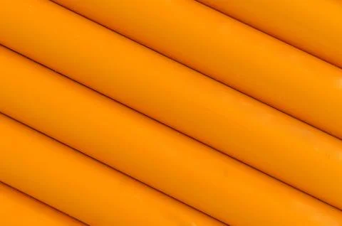Orange plastic tubing pattern texture background Stock Photos