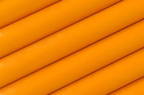 Orange plastic tubing pattern texture background Stock Photos
