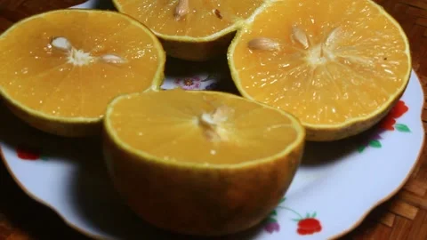 Orange on plate Video stock 291912945