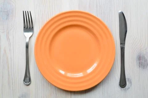 Orange plate Stock-Fotos