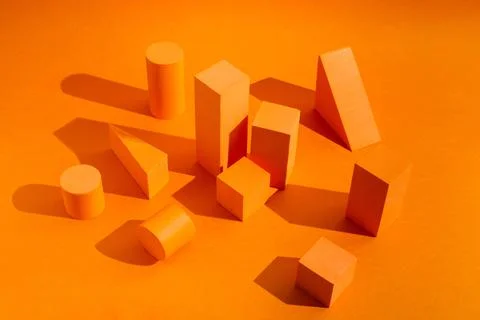 Orange platforms with empty space for products with geometrical figures 스톡 사진