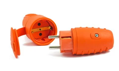 The orange plug and the socket on white Foto stock