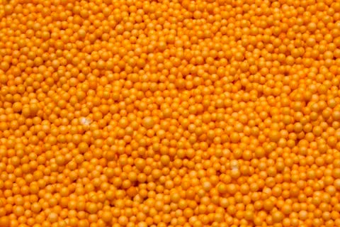 Orange Polysterene balls background Stock Photos