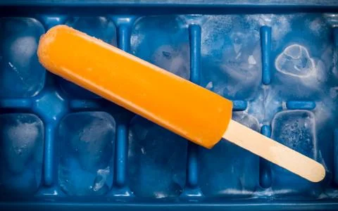 Orange popsicle Stock Photos