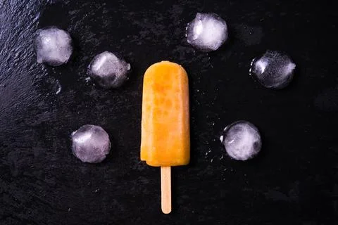 Orange popsicle Stock Photos