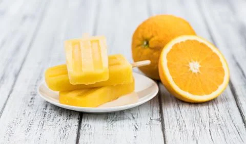 Orange Popsicles (selective focus) Stock Photos