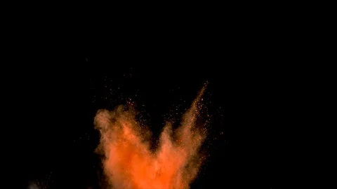 Orange powder explosion. Slow motion with acceleration in vertical motion Stock Footage 122452830