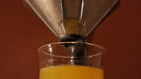 Orange press juicer Stock Footage 60240832