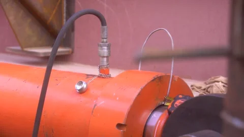 Orange press, moves the sliding structure Stock Footage 276964715