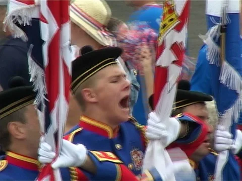 Orange protestants shouting in an Orange march Stock Footage 77270270