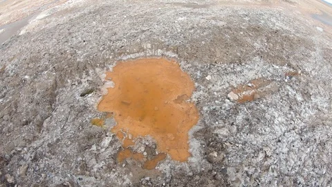 Orange puddle water pool at salt lake desert Chile. San Pedro De Atacama Stock Footage 93848561