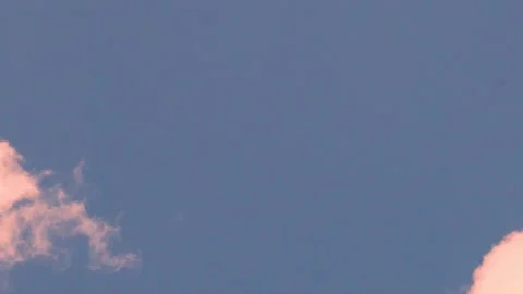 Orange Puffy Clouds Appear in a Clear Cloudless Blue Sky Time Lapse. Summer Plum Stock Footage 313526847