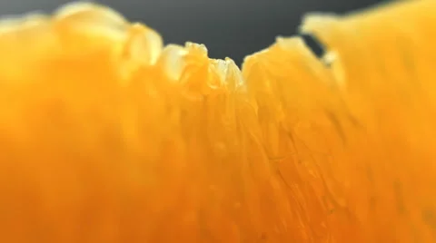 Orange pulp rotating closeup, beautiful soft focus macro shot Stock Footage 46375458