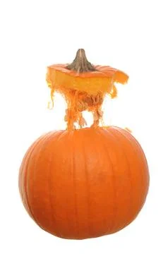 Orange pumpkin  isolated on a white background with its top floating above it Stock Photos