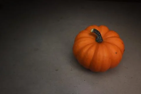 Orange pumpkin with mysterious shadows. Foto stock