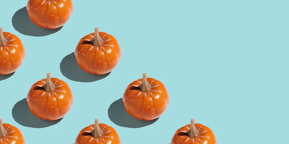 Orange pumpkin pattern on pastel color background Stock Illustration