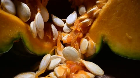 Orange pumpkin with seeds close up Stock Footage 290380936