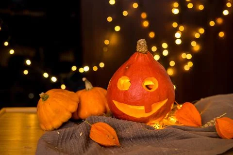 Orange pumpkins on the background and blurry lights. halloween concept. Stock Photos