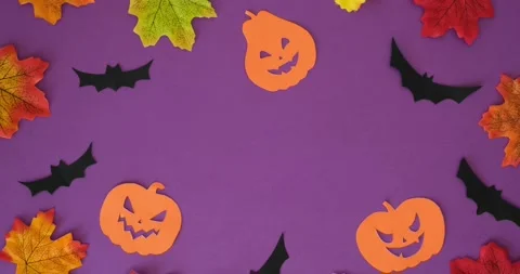 Orange pumpkins shapes, bats, fall leaves and place for text Stock Footage 345118666