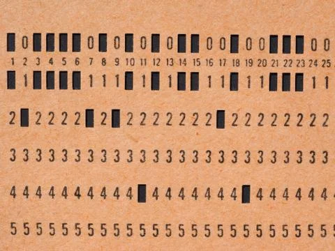 Orange punched card for programming 库存照片